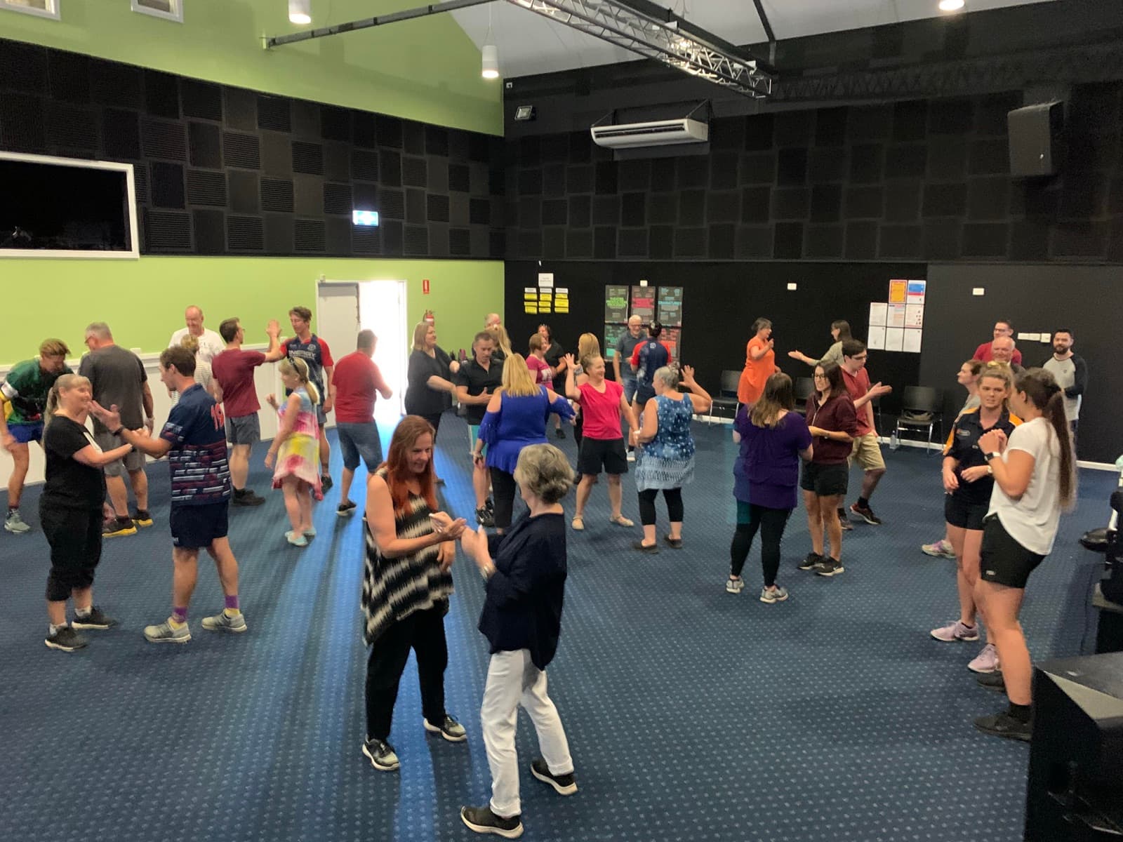 A staff room of teachers mid-game